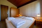 Ferienwohnpark Immenstaad am Bodensee Satteldachhaus (Typ 9) SD 09 Bodensee - Schlafzimmer