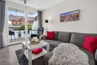  Ferienwohnung Karin Norderney - Wohnzimmer
