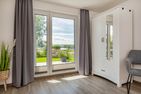  Ferienhaus Seebrise Loddin - Gartenblick