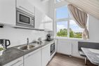 Ferienhaus "Meeresbrise" Marina Wendtorf Kieler Förde - Küche / Küchenzeile