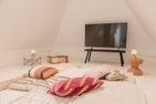  Traumhaus unter Reet Utersum - Das Dachgeschoss bietet Platz zum Spielen, Fernsehen und Lesen.