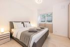  Ferienwohnung SonnenReich Kölpinsee - Schlafzimmer