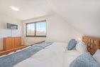  Ferienhaus Sonnendeck mit Sauna, Kamin & Terrasse für 12 Personen Ückeritz - Schlafzimmer