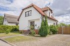  Ferienhaus Sonnendeck mit Sauna, Kamin & Terrasse für 12 Personen Ückeritz - Fassade / Eingang
