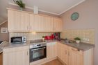  Ferienwohnung Thurbruch mit Sonnenterrasse, ruhig gelegen und perfekt für 4 Personen. Zirchow - Küche / Küchenzeile