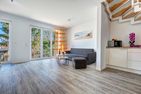  Ferienhaus Ostseeparadies mit 2 Bädern und Terrasse - der Strand ist nur 800 Meter entfernt Kölpinsee - Wohnzimmer