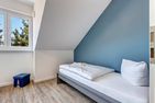  Ferienhaus Ostseeparadies mit 2 Bädern und Terrasse - der Strand ist nur 800 Meter entfernt Kölpinsee - Schlafzimmer