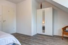  Ferienhaus Ostseeparadies mit 2 Bädern und Terrasse - der Strand ist nur 800 Meter entfernt Kölpinsee - Schlafzimmer