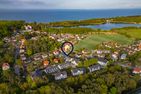  Ferienhaus Ostseeparadies mit 2 Bädern und Terrasse - der Strand ist nur 800 Meter entfernt Kölpinsee - Vogelperspektive