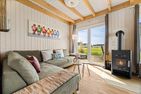  Ferienhaus Dannig Deern Olpenitz Ostseeresort Olpenitz - Wohnzimmer