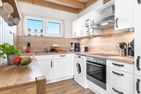  Ferienhaus Kiek Inn Olpenitz Ostseeresort Olpenitz - Küche / Küchenzeile