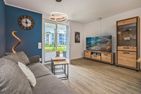  Ferienwohnung Otterhöhle mit Fitness-, Sauna und Kinderspielbereich. Zirchow An der Haffküste - Wohnzimmer
