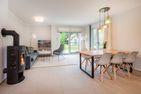  Ferienhaus Haffglück mit Sauna, Kamin und Terrasse mit Haffblick Zirchow Fischerdorf - Wohnzimmer
