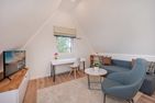 Ferienhaus Haffglück mit Sauna, Kamin und Terrasse mit Haffblick Zirchow Fischerdorf - Wohnzimmer