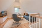  Ferienhaus Haffglück mit Sauna, Kamin und Terrasse mit Haffblick Zirchow Fischerdorf - Wohnzimmer