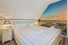  Ferienwohnung Inselzeit auf 2 Etagen mit Strandkorb und Balkon Loddin - Schlafzimmer