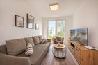  Ferienwohnung Haffkoje Fitness, Sauna und Kinderspielbereich Zirchow An der Haffküste - Wohnzimmer