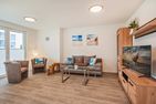  Ferienwohnung Klippenblick mit Sauna, Kinderspielbereich und Fitnessraum Zirchow An der Haffküste - Wohnzimmer