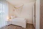  Ferienwohnung Klippenblick mit Sauna, Kinderspielbereich und Fitnessraum Zirchow An der Haffküste - Schlafzimmer