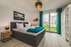  Ferienwohnung Meerzeit mit Sauna, Balkon und Wellnessbereich Zirchow An der Haffküste - Schlafzimmer