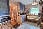  Ferienhaus Dorfhotel Wattwurm Ostfriesland - Küche / Küchenzeile