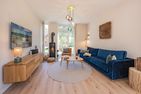  Ferienhaus Reethus bei den Wassern mit Sauna, Kamin und Terrasse Loddin - Wohnzimmer