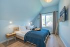  Ferienhaus Reethus bei den Wassern mit Sauna, Kamin und Terrasse Loddin - Schlafzimmer