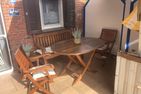  Ferienhaus Dorfhotel Wattwurm Ostfriesland - Terrasse