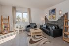 Villa Petra App. Ahlbeck mit Balkon, Kamin und Seeblick Korswandt - Wohnzimmer
