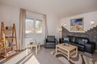 Villa Petra App. Ahlbeck mit Balkon, Kamin und Seeblick Korswandt - Wohnzimmer