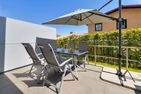  Ferienhaus Nordhorn mit Sonnenterrasse, 2 Schlafzimmern & Strandkorb Kölpinsee - Terrasse