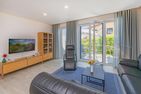  Ferienhaus Nordhorn mit Sonnenterrasse, 2 Schlafzimmern & Strandkorb Kölpinsee - Wohnzimmer