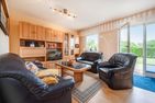  Ferienhaus Albatros mit Terrasse, Balkon und Garten Heringsdorf - Wohnzimmer