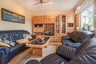  Ferienhaus Albatros mit Terrasse, Balkon und Garten Heringsdorf - Wohnzimmer