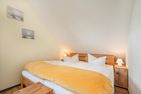  Ferienhaus Albatros mit Terrasse, Balkon und Garten Heringsdorf - Schlafzimmer