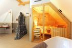  Ferienhaus Reethäus'l mit Whirlpool, Sauna, Kamin und Terrasse Ostseebad Karlshagen - Hauptansicht