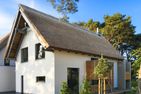  Ferienhaus Reethäus'l mit Whirlpool, Sauna, Kamin und Terrasse Ostseebad Karlshagen - Fassade / Eingang