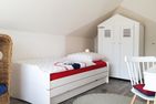  Ferienhaus Reethäus'l mit Whirlpool, Sauna, Kamin und Terrasse Ostseebad Karlshagen - Schlafzimmer
