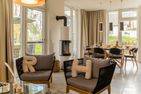  Ferienhaus Reethäus'l mit Whirlpool, Sauna, Kamin und Terrasse Ostseebad Karlshagen - Wohnzimmer