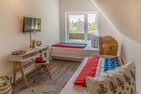  Ferienhaus Reethäus'l mit Whirlpool, Sauna, Kamin und Terrasse Ostseebad Karlshagen - Schlafzimmer