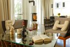  Ferienhaus Reethäus'l mit Whirlpool, Sauna, Kamin und Terrasse Ostseebad Karlshagen - Wohnzimmer