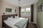  Ferienwohnung Strandläufer mit Badewanne, Terrasse mit Grill und Strandkorb Ahlbeck - Schlafzimmer