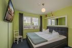  Ferienwohnung Strandläufer mit Badewanne, Terrasse mit Grill und Strandkorb Ahlbeck - Schlafzimmer