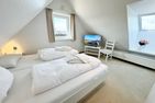  Trutz blanker Hans  - Dünenstr. 19, App. 8 Wenningstedt - Schlafzimmer