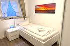 Trutz blanker Hans  - Dünenstr. 19, App. 9 Wenningstedt - Schlafzimmer