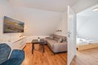  Ferienwohnung Am Bahnhof mit 2 Bädern und nur 700 m zum Strand Ahlbeck - Wohnzimmer