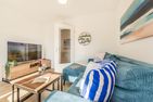  Ferienwohnung Haff & Herz mit Balkon, Freizeit- und Kinderspielbereich Zirchow An der Haffküste - Wohnzimmer