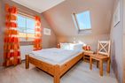  Ferienhaus Golfblick mit Sonnenterrasse und Kamin Korswandt - Schlafzimmer