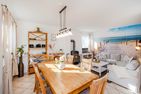  Ferienhaus Golfblick mit Sonnenterrasse und Kamin Korswandt - Wohnzimmer