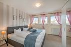  Ferienwohnung Strandbrise mit Kamin und Balkon Koserow - Schlafzimmer
